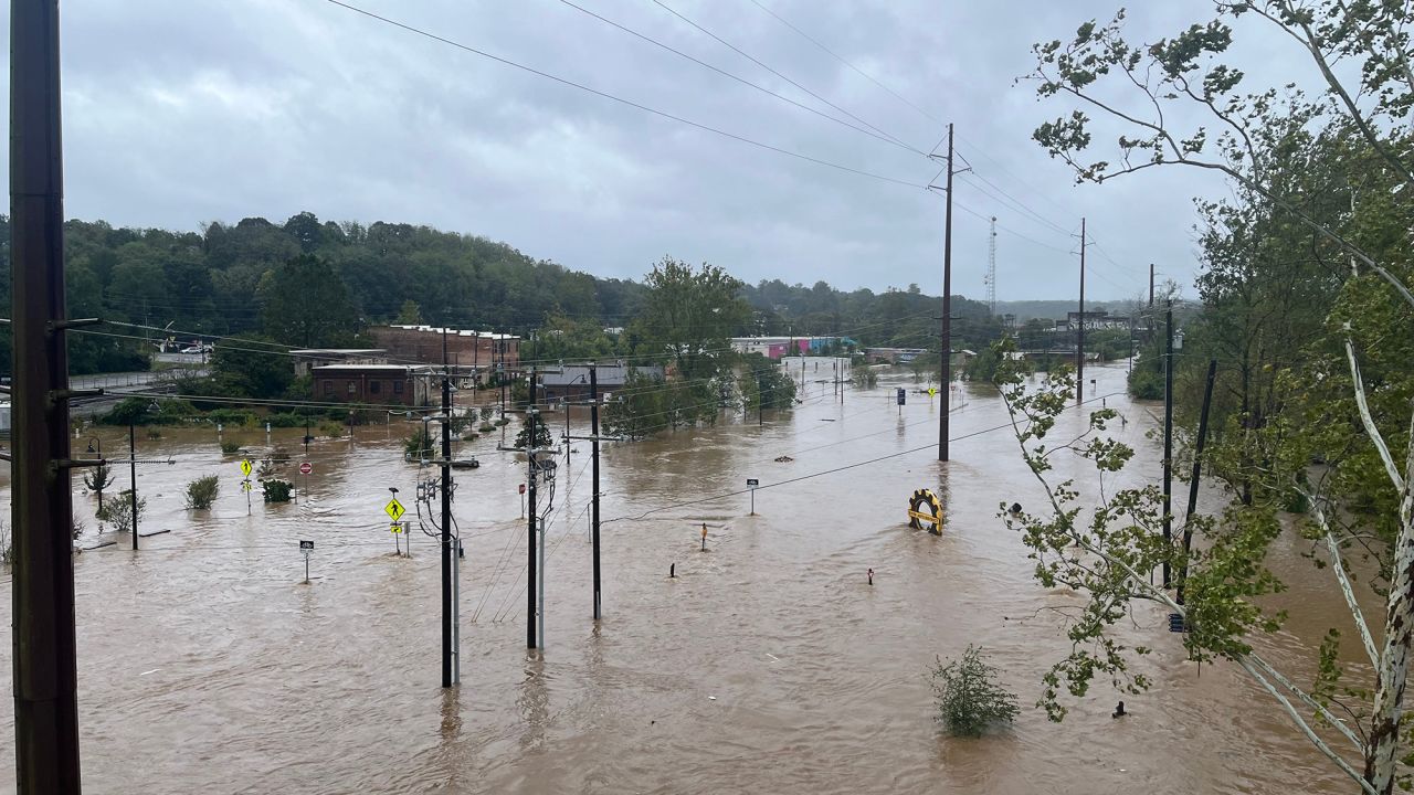 The French Broad River in Asheville reached over 16 feet by 11 am on Friday.