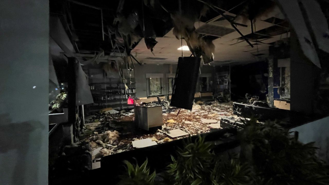 Damage caused by a possible tornado from the outer bands of Hurricane Milton is seen on Wednesday in Cocoa Beach, Florida.