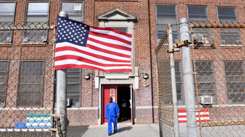 A voter exits the Yorkship Family School in Camden, New Jersey, after casting her ballot on Tuesday.