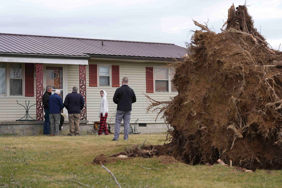 Gov. Bill Lee speaks with residents of Twin Bridge Road while on a tour of tornado damage in Morgan County, Tennessee on February 7, 2025.
