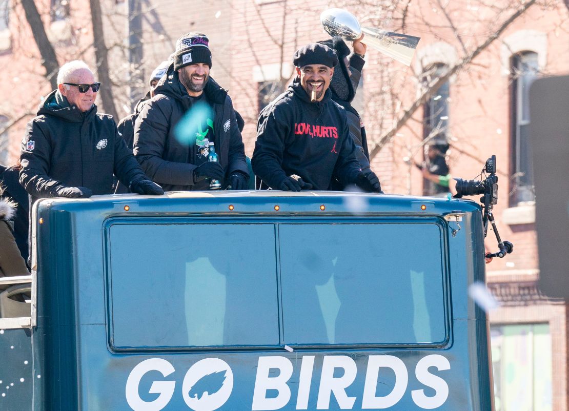 Philadelphia Eagles owner Jeffrey Lurie, head coach Nick Sirianni and quarterback Jalen Hurts celebrate the Super Bowl win during the parade on Friday.