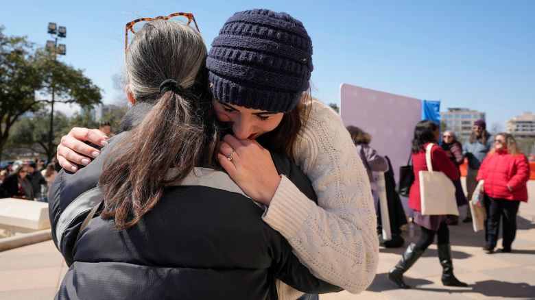 Summer Willis, right, a survivor of sexual assault, hugs Paulina Pizarro at a rally in support of domestic and sexual assault survivors at the Capitol Thursday February 20, 2025. Survivors of violence and advocates with The Texas Council on Family Violence and The Texas Association Against Sexual Assault rallied to push for policy and funding items during the 89th Legislative Session.