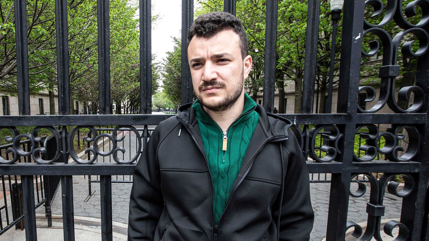 Mahmoud Khalil stands outside Columbia University in April 2024.