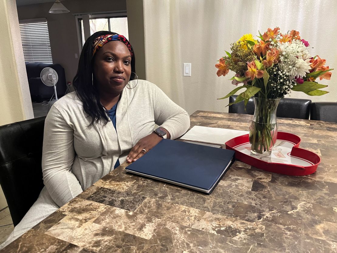 Tanisha Hartwell-Parris and her husband, Marlon Parris, keep a binder of his immigration and military service paperwork.