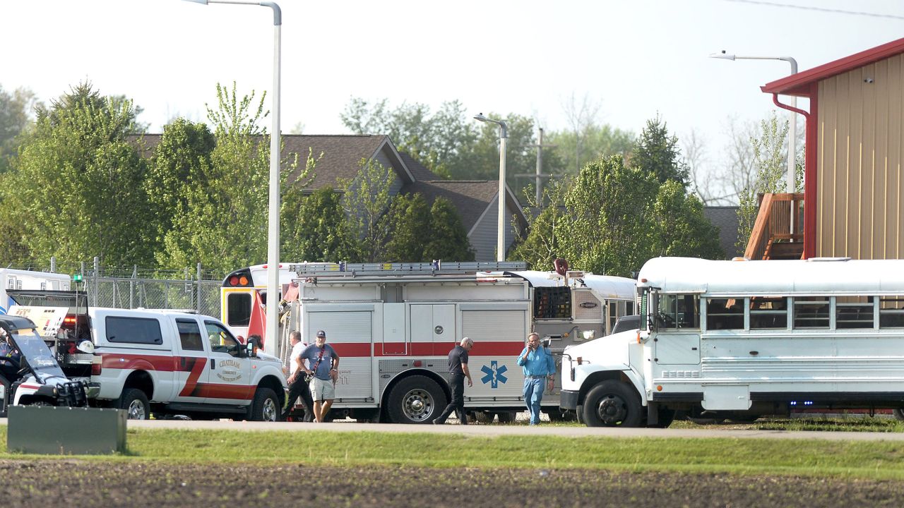Emergency vehicles and personnel outside of YNOT Outdoors, an after-school program in the 300 block of North Breckenridge in Chatham, Ill., on April 28, 2025. Four people were killed after a driver drove through the building, police said.