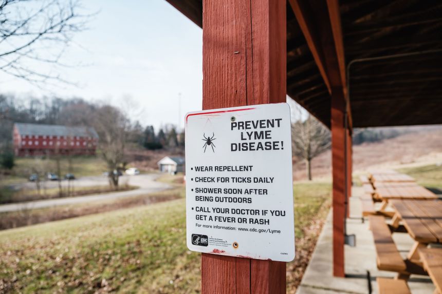 A sign warning people about Lyme Disease is seen at the Norma Johnson Center.