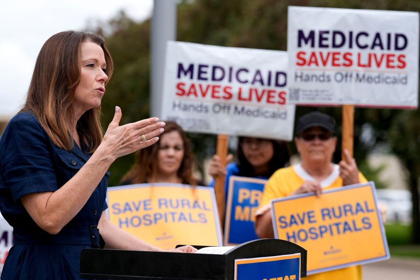 Christina Bohannan, a candidate for Iowa's 1st Congressional District, holds a press conference following a visit to the Washington County Hospitals & Clinics in Washington, Iowa, on July 30.