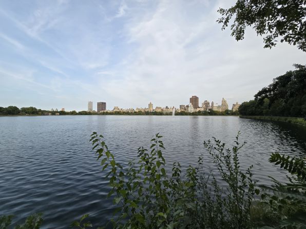 An ultrawide view of Jacqueline Kennedy Onassis Reservoir and the east side on the horizon