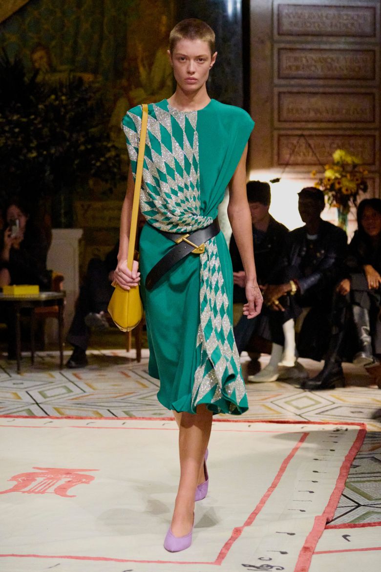 Some of Versace's signatures surfaced in the new collection, such as a version of the checkerboard print that has featured in past designs...