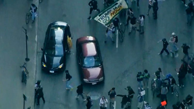https://media.cnn.com/api/v1/images/stellar/prod/video-car-chicago-ice-protest-digvid.jpg?c=16x9&q=w_800,c_fill