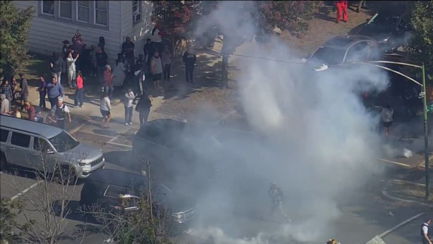 Protesters and officials face off in Chicago at scene of apparent crash
