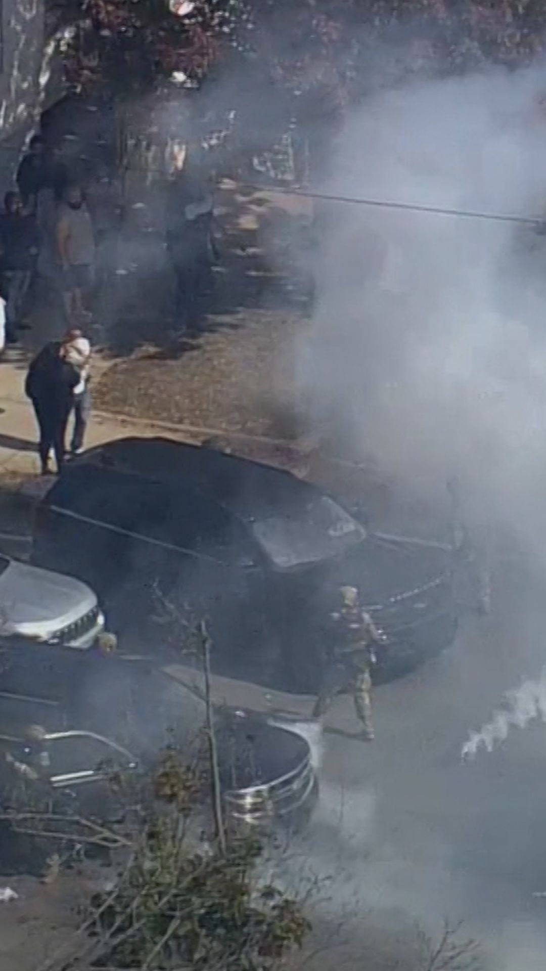 Protesters and officials face off in Chicago at scene of apparent crash