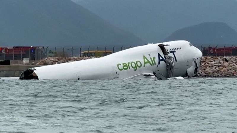 Cargo plane fatally slides off runway in Hong Kong