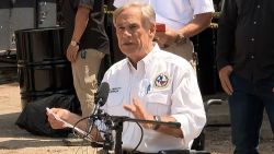 Texas Gov. Gregg Abbott holds a press conference in Hunt, Texas after touring the area devastated by deadly floods in the area.