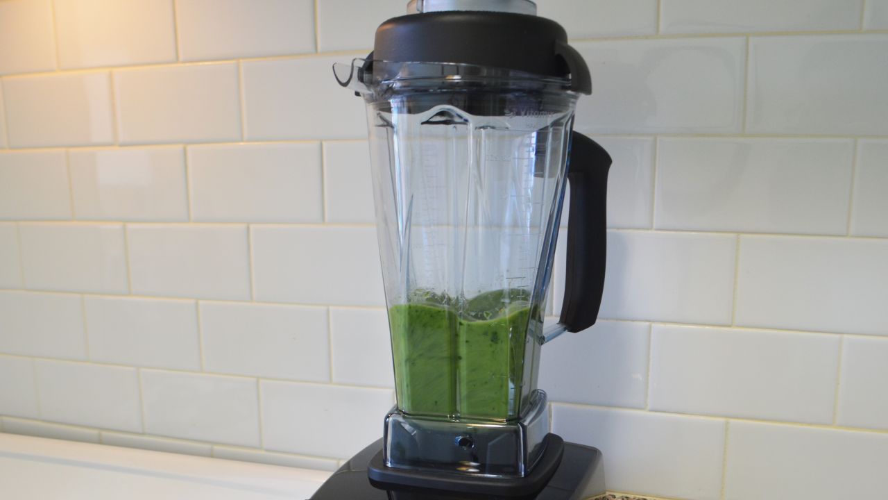 Vitamix blender with green smoothie