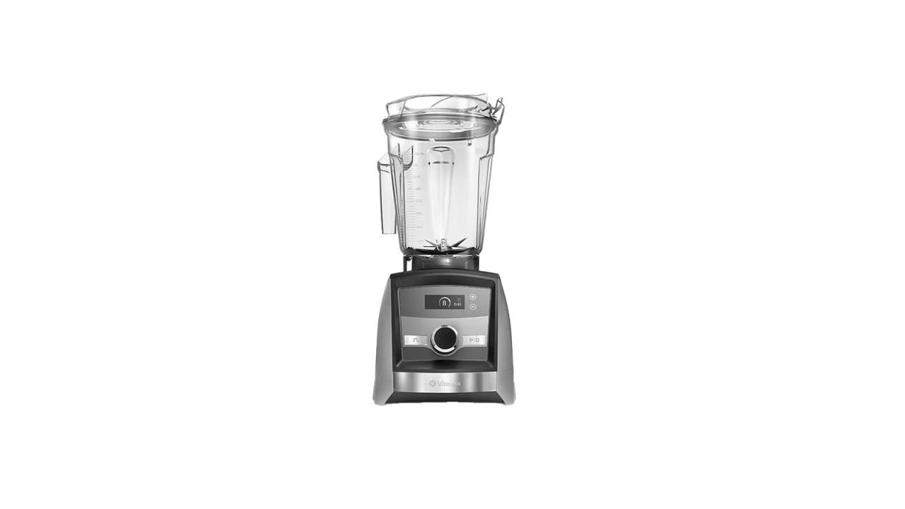 Empty Vitamix blender placed against white background.