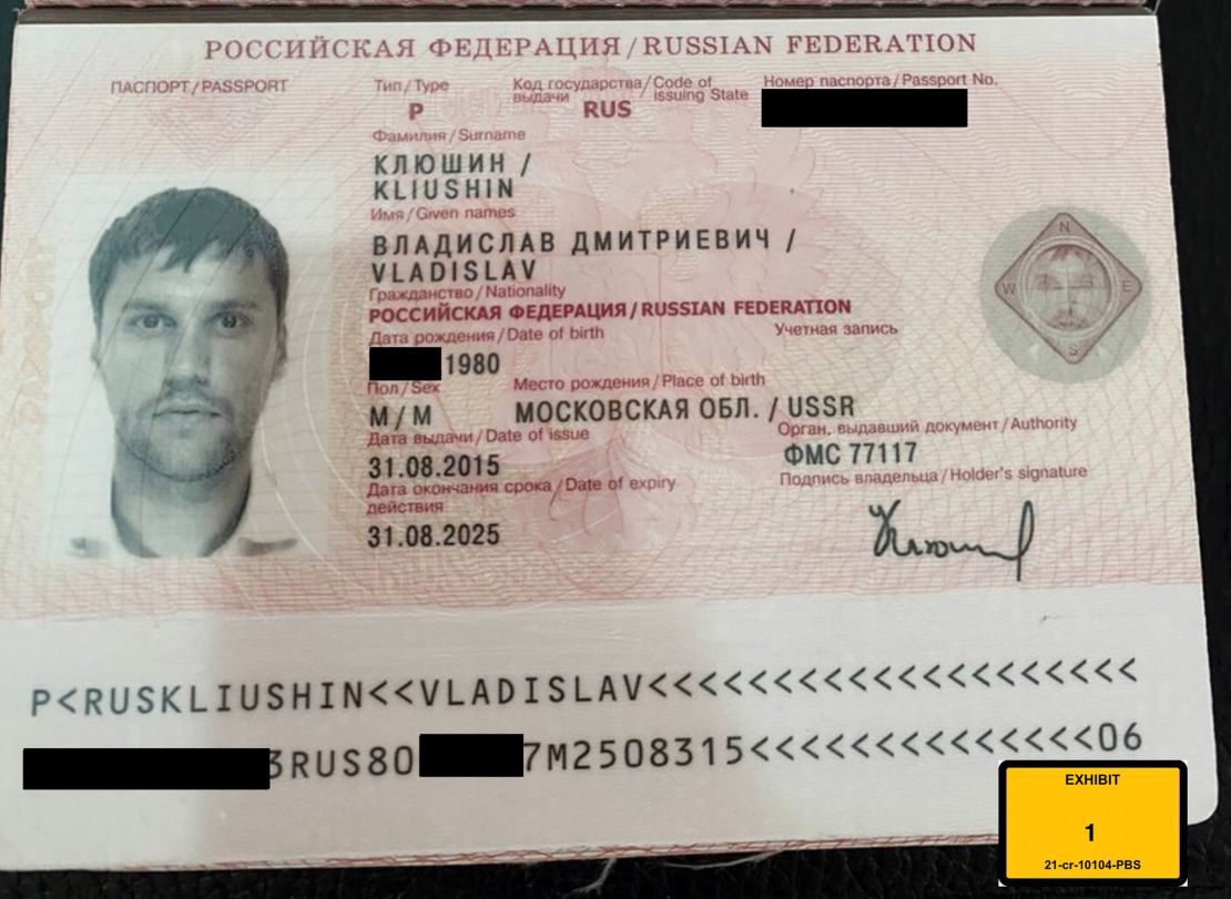 This image provided by the US Attorney’s Office shows the Russian passport of Vladislav Klyushin.