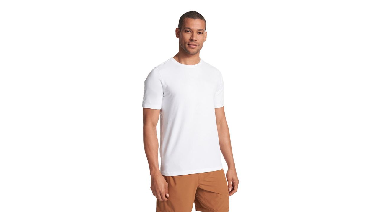 A model wearing the Vuori Strato Tech Tee in white.