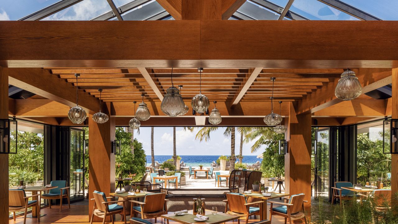A dining area at the Waldorf Astoria Maldives Ithaafushi
