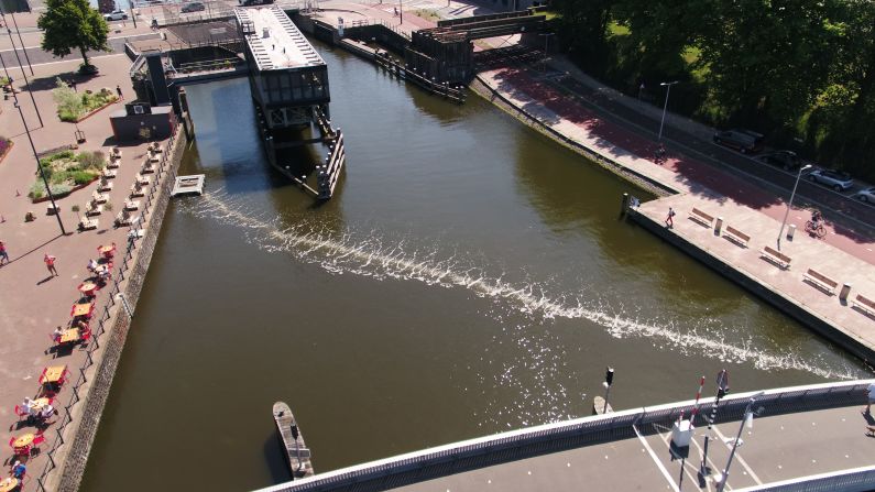 The Great Bubble Barrier, a Dutch social enterprise, uses bubbles to stop plastic in rivers from getting into the oceans. A bubble curtain is created by pumping air through a perforated tube on the bottom of the waterway. That creates an upward current which directs plastic to the surface. By placing the Bubble Barrier diagonally across the river, the natural flow of the water will push the plastic waste to the side and into the catchment system.