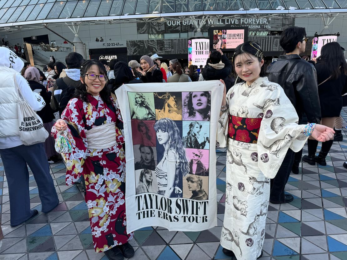Taylor Swift fans pose for pictures ahead of the first leg of her Asia-Pacific Eras Tour in Tokyo on February 7, 2024.