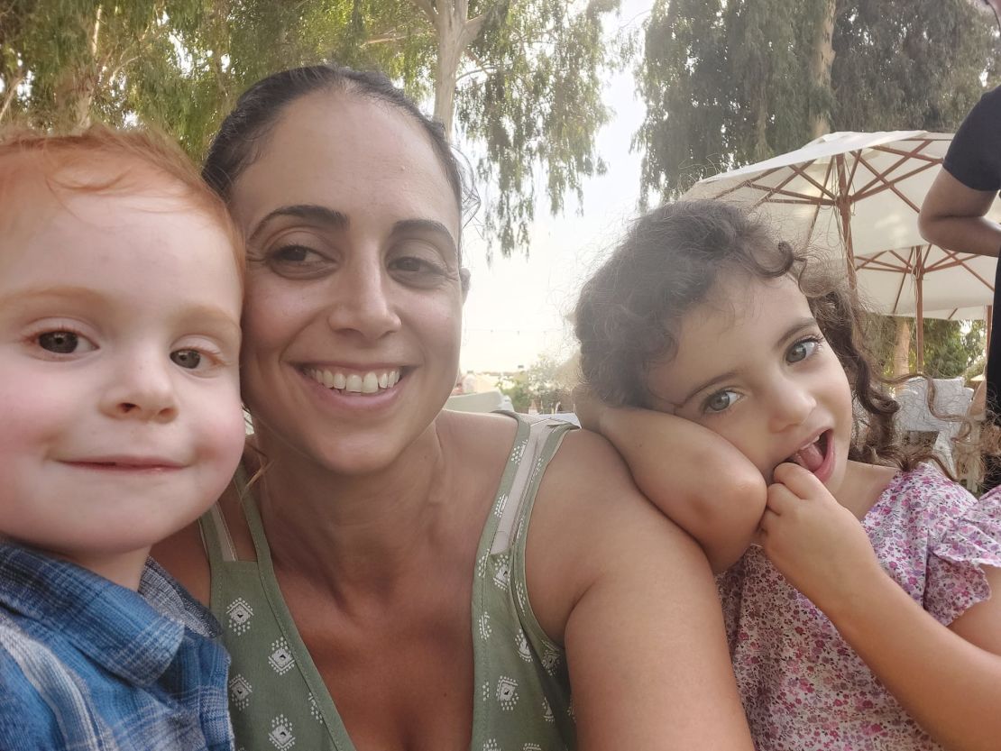 Ofri Bibas Levy with her nephew Ariel (left), now a hostage in Gaza, and her daughter (right).
