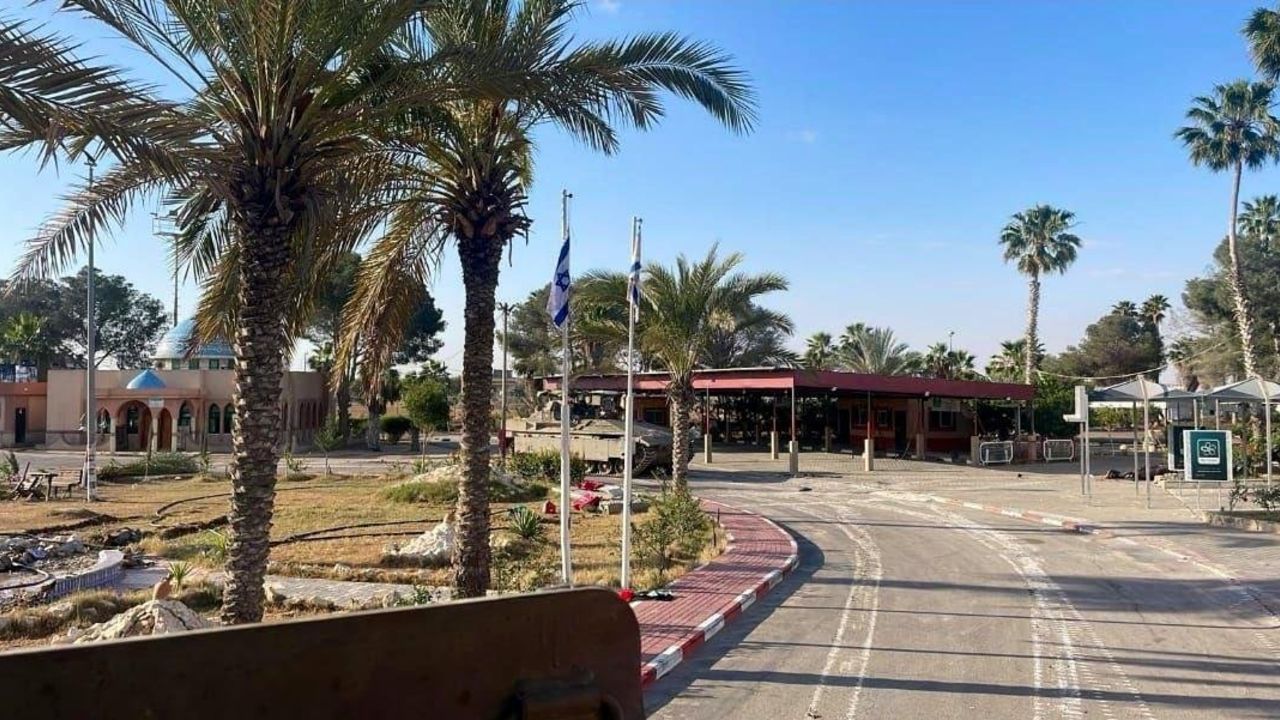 A photo from social media shows two Israeli flags mounted outside the Palestinian side of the Rafah crossing’s main building, on May 7.