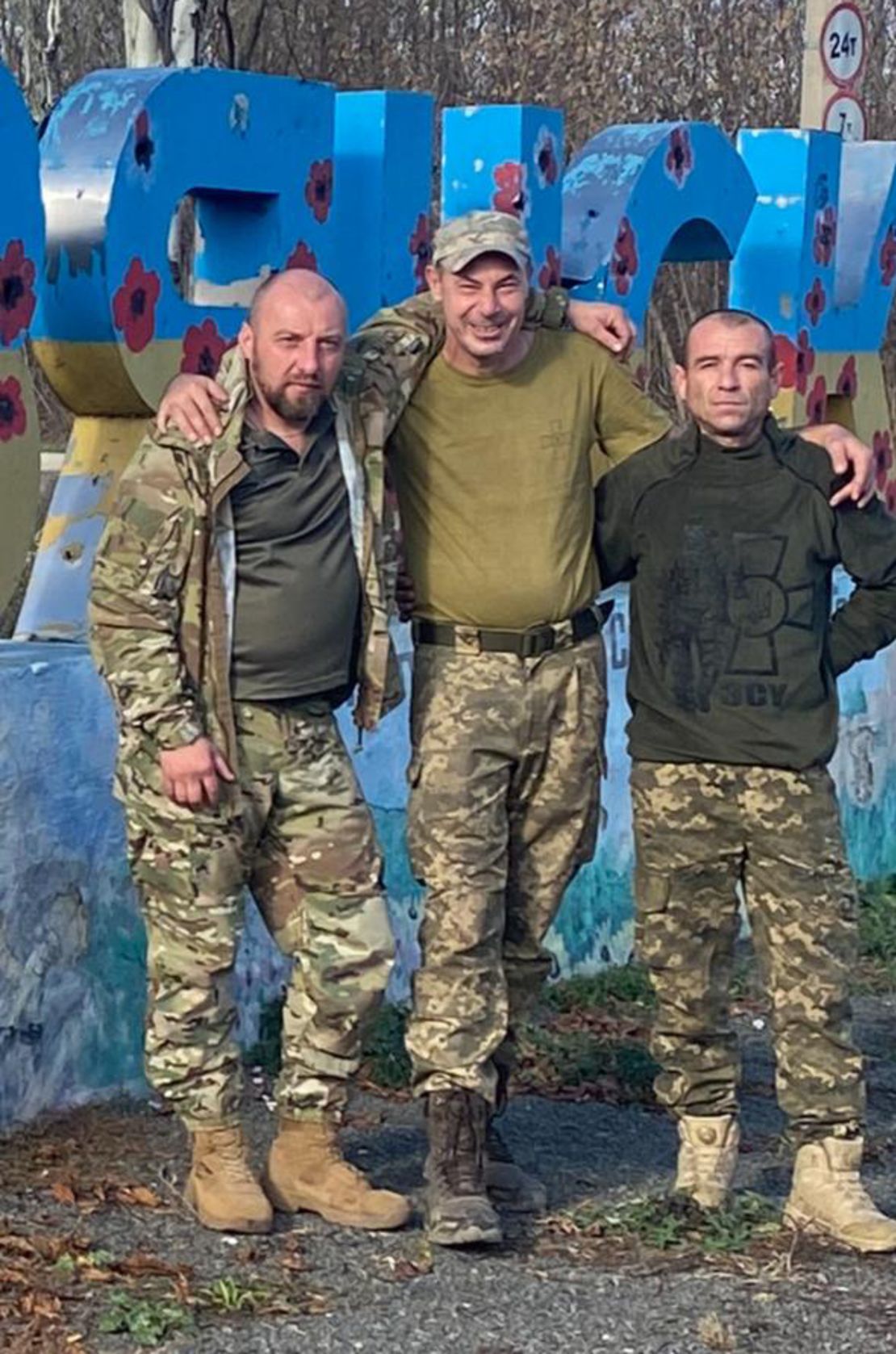 Pavlo Kushnirov, left, is seen while serving in the Ukrainian military before losing his legs in a Russian attack last December.