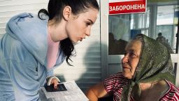 Hanna Fedorkovska and her grandmother arrive to an evacuation center in Sumy, Ukraine.