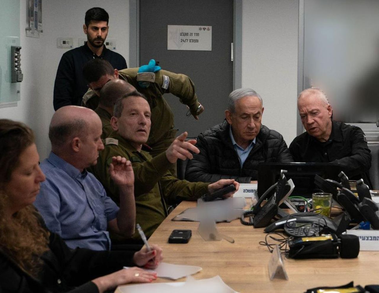 Israeli Prime Minister Benjamin Netanyahu and Defense Minister Yoav Gallant monitor the attack on Iran from an undisclosed location. Parts of the image were obscured by the Israel Defense Forces.