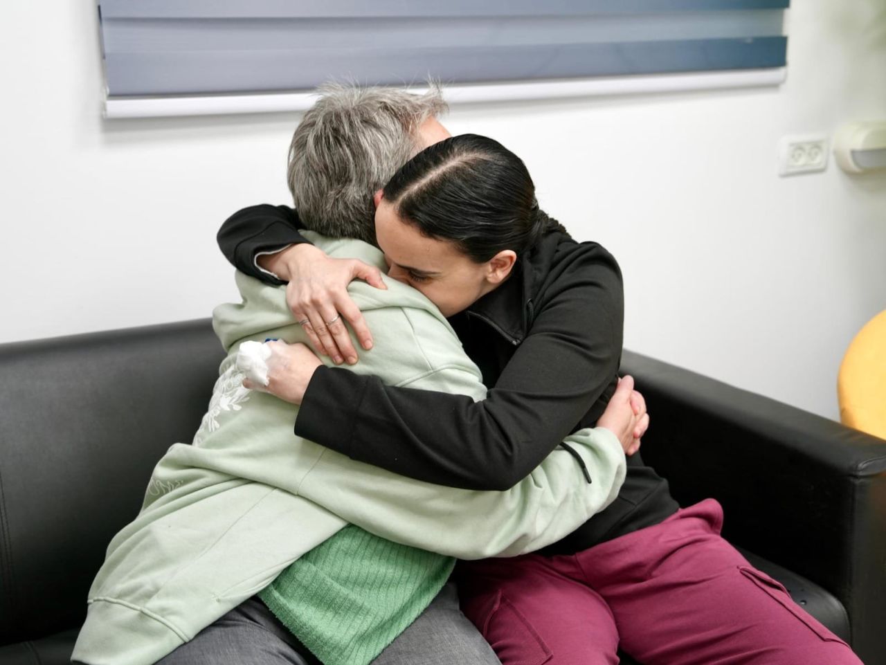 Former hostage Emily Damari reunites with her mother after being released on Sunday.