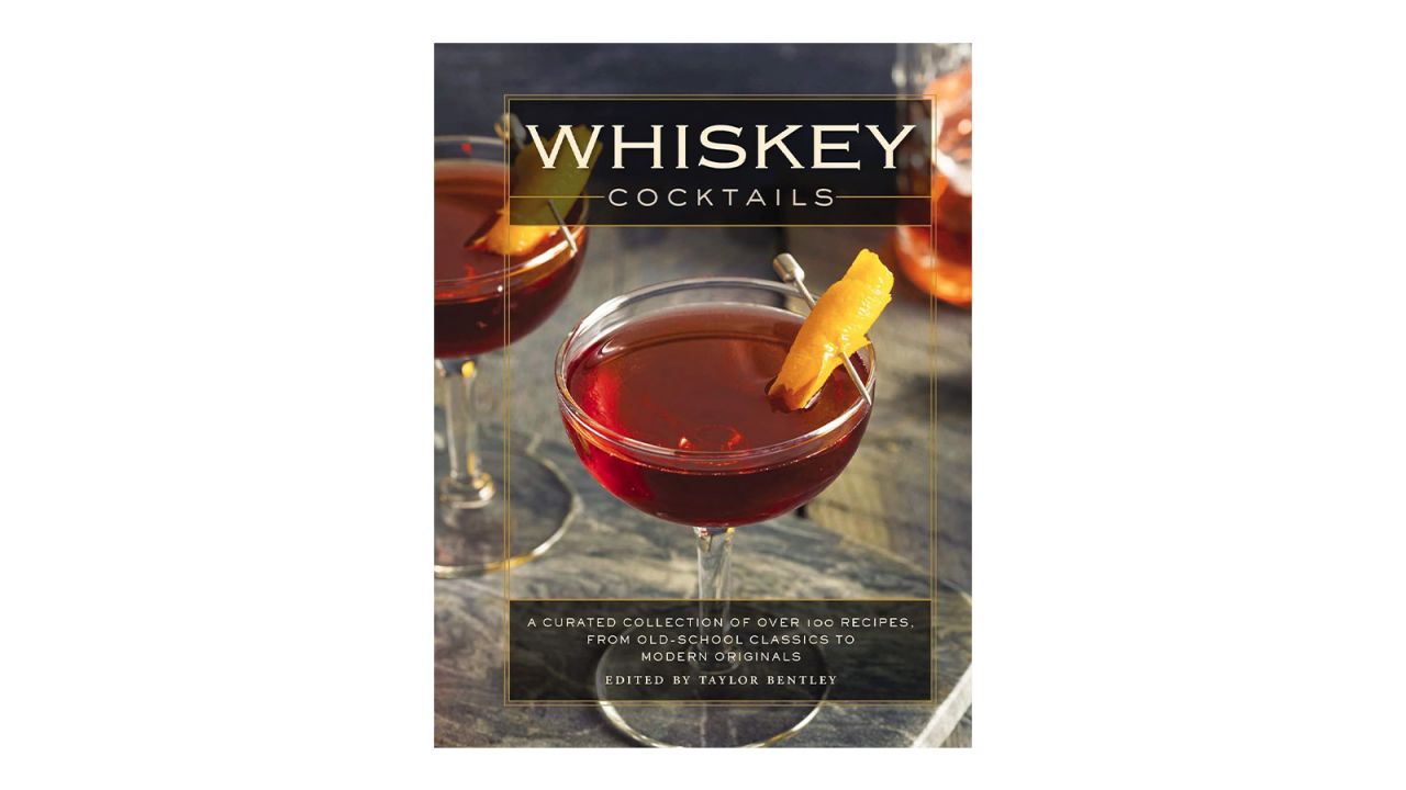 The book "Whiskey Cocktails: A Curated Collection of Over 100 Recipes" on a white background.