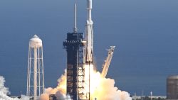 A SpaceX Falcon Heavy rocket with the Europa Clipper spacecraft aboard launches from Launch Complex 39A at NASA's Kennedy Space Center in Cape Canaveral on October 14, 2024. The spacecraft Clipper will soon launch for Jupiter's moon Europa, one of dozens of moons orbiting the Solar System's biggest planet and the nearest spot in our celestial neighborhood that could offer a perch for life. It should reach orbit around Jupiter and Europa in 2031, where it will begin a detailed study of the moon scientists believe is covered in frozen water, which could provide a similar habitat to Earth. (Photo by CHANDAN KHANNA / AFP) (Photo by CHANDAN KHANNA/AFP via Getty Images)