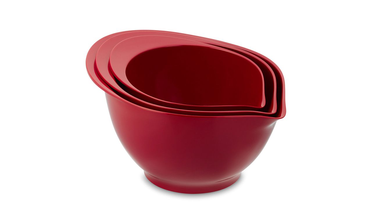 Three red nesting mixing bowls.