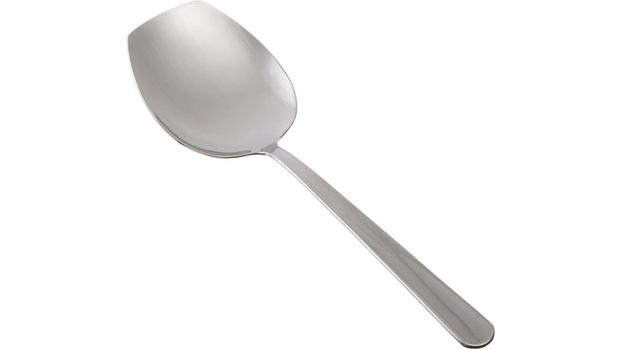 Winco spoon against white background.