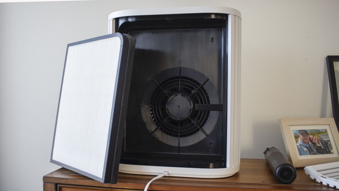 The filter of the Windmill Air Purifier is removed to reveal the unit's fan.