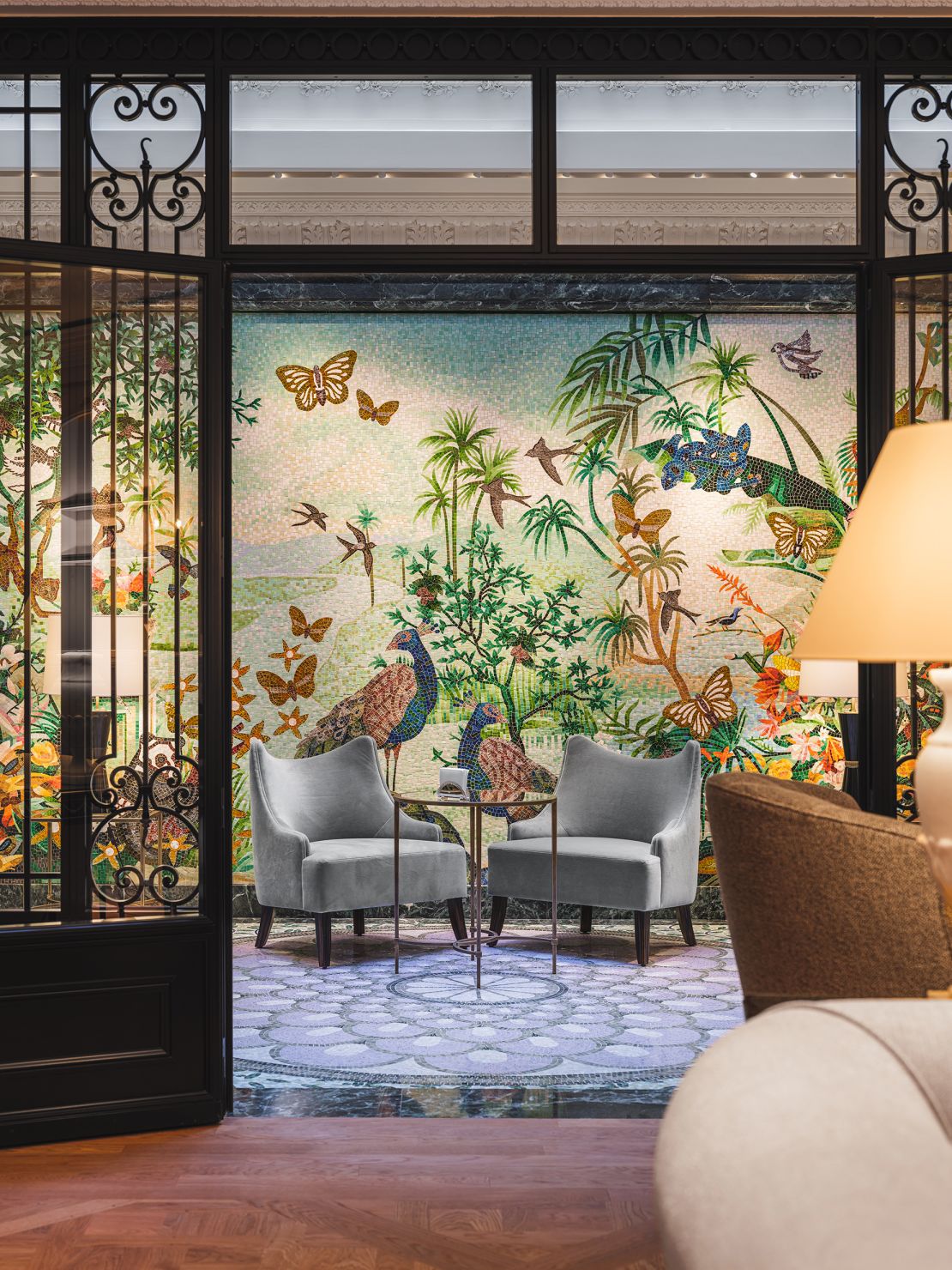 The property's “Winter Garden,” features a glass-roofed sitting room bathed in natural light featuring a mosaic created with cabochon gemstones.