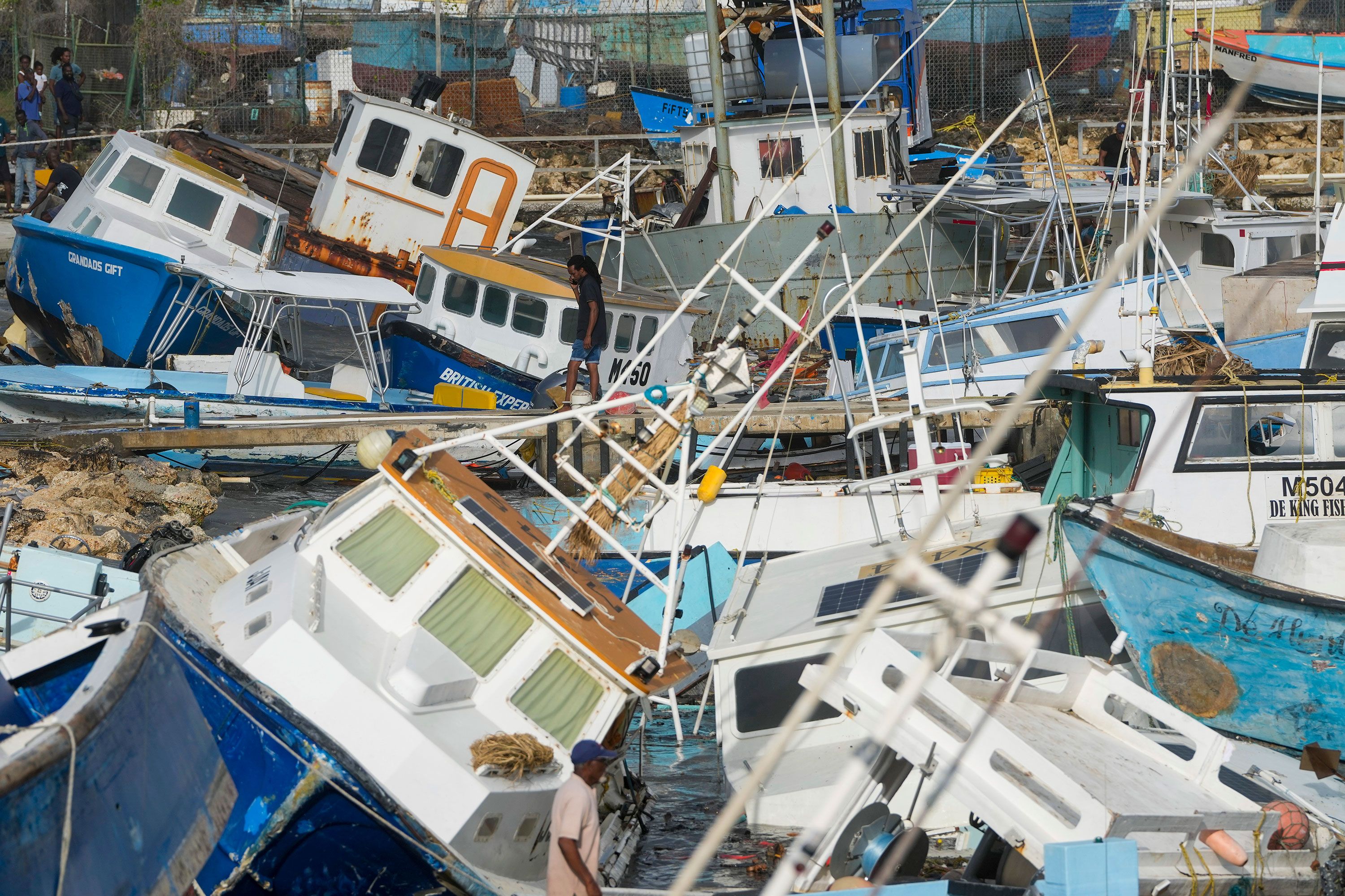 Fishing boats, damaged by Hurricane Beryl, sit in a heap at the Bridgetown Fisheries in Barbados on Monday, July 1.