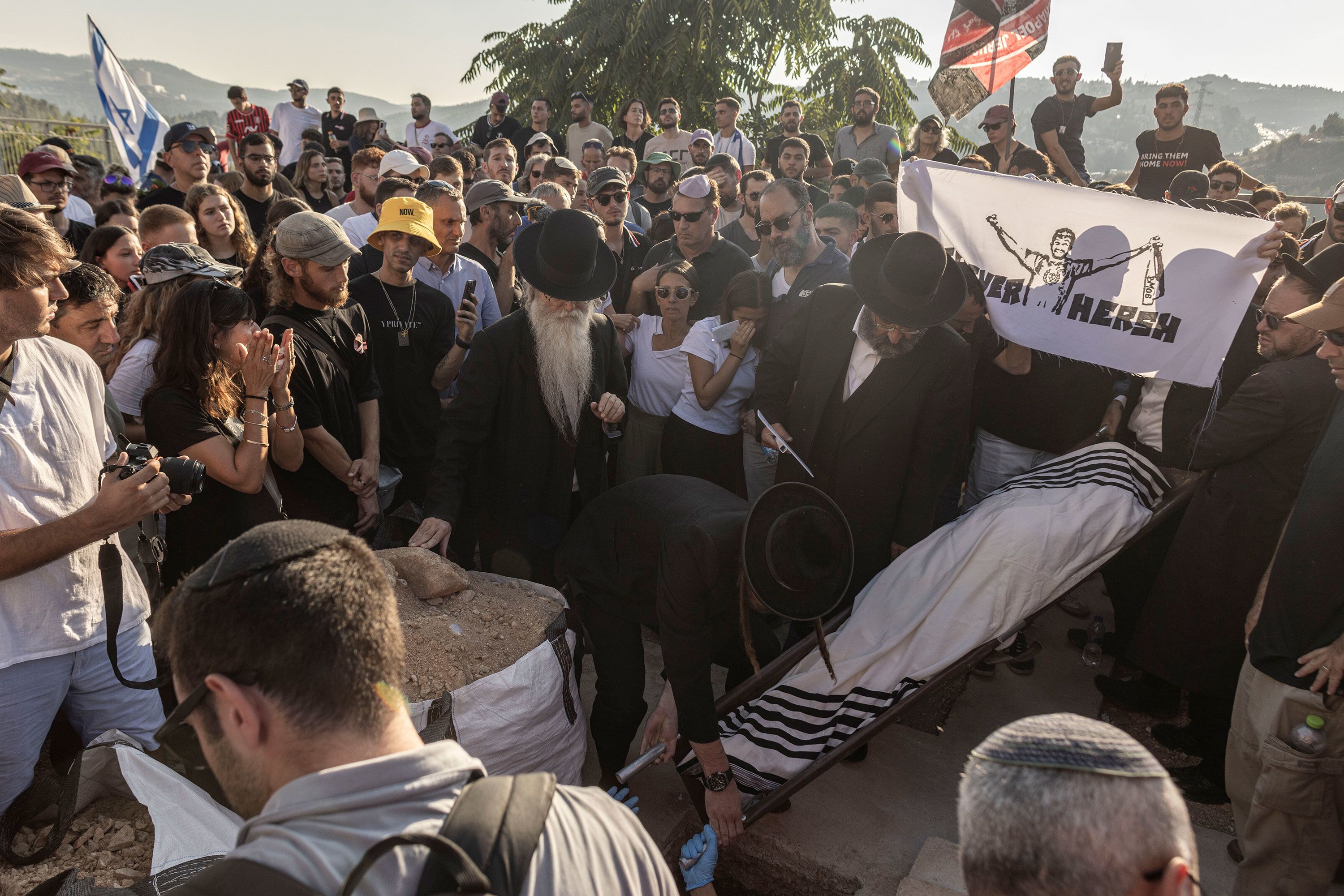 People attend the funeral of <a >Hersh Goldberg-Polin</a> in Jerusalem on Monday, September 2. Goldberg-Polin, a 23-year-old Israeli American, was one of <a >six hostages</a> who were found killed a day earlier in Gaza.