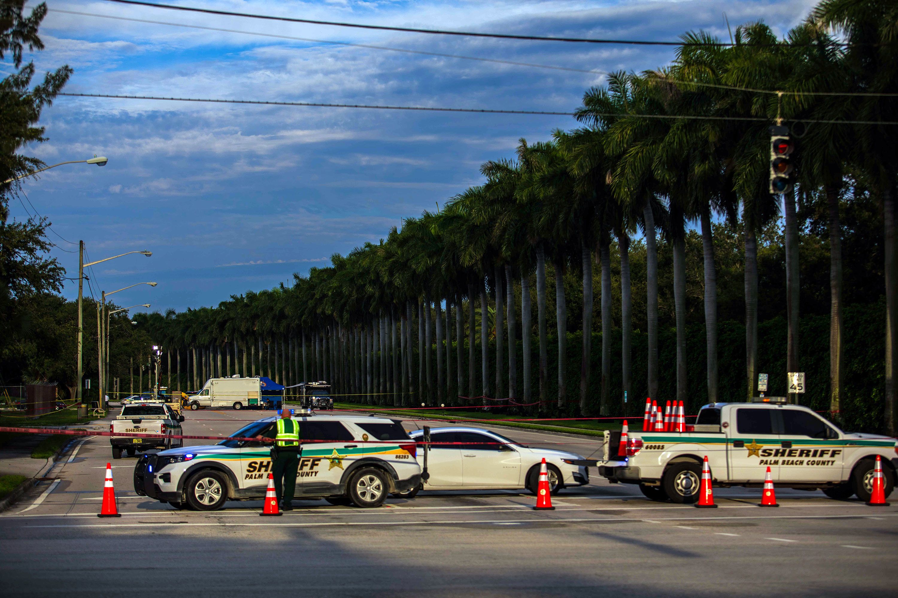 A police roadblock is set up outside the Trump International Golf Club in West Palm Beach, Florida, on Monday, September 16 — a day after there was an apparent assassination attempt on former President Donald Trump.