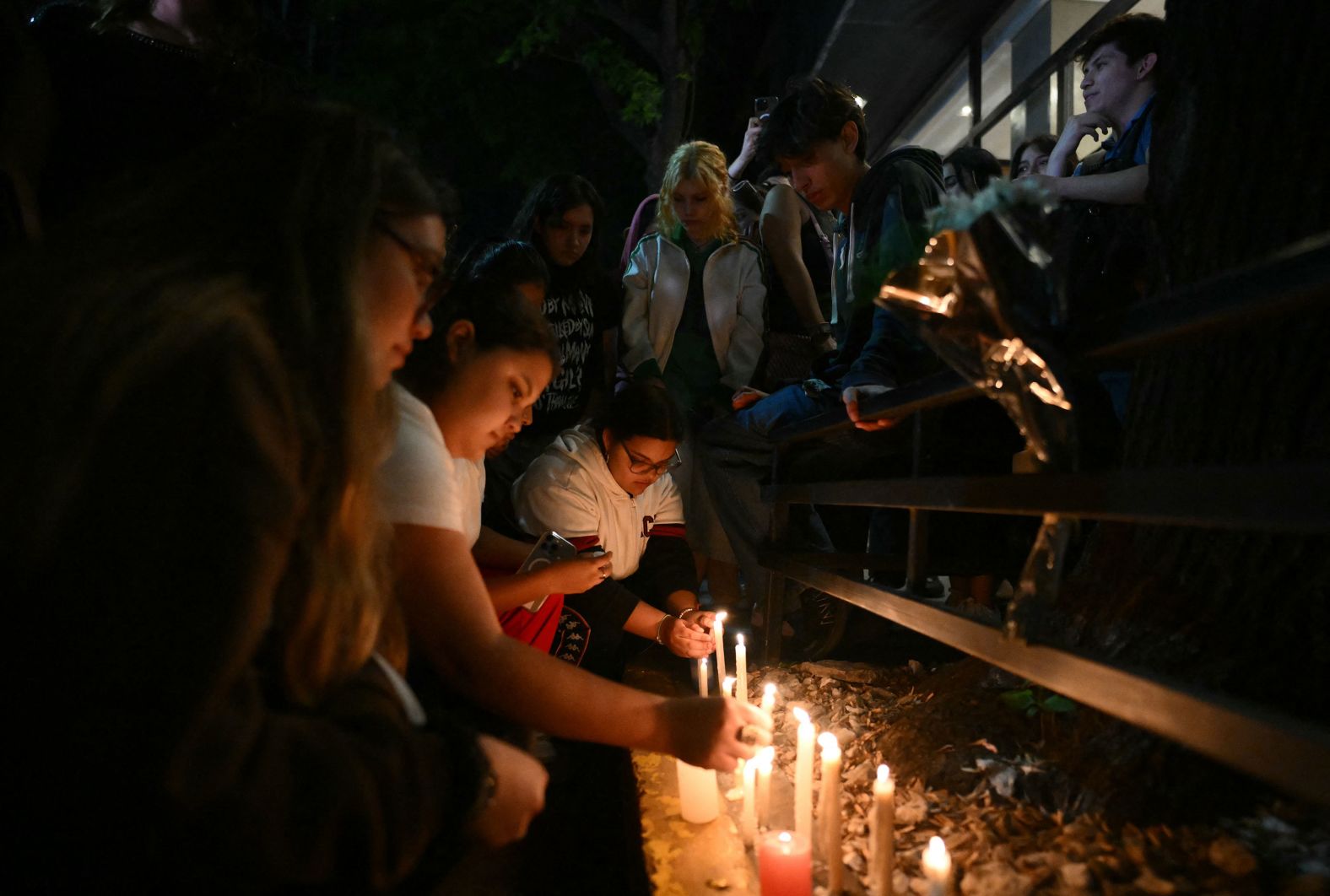 Fans of singer Liam Payne light candles next to the hotel where he died in Buenos Aires on Wednesday, October 16. Payne, a former member of the boy band One Direction, <a href="index.php?page=&url=https%3A%2F%2Fwww.cnn.com%2F2024%2F10%2F16%2Fentertainment%2Fliam-payne-death-one-direction%2Findex.html">fell from the third floor of the hotel</a>, according to local police. He was 31.
