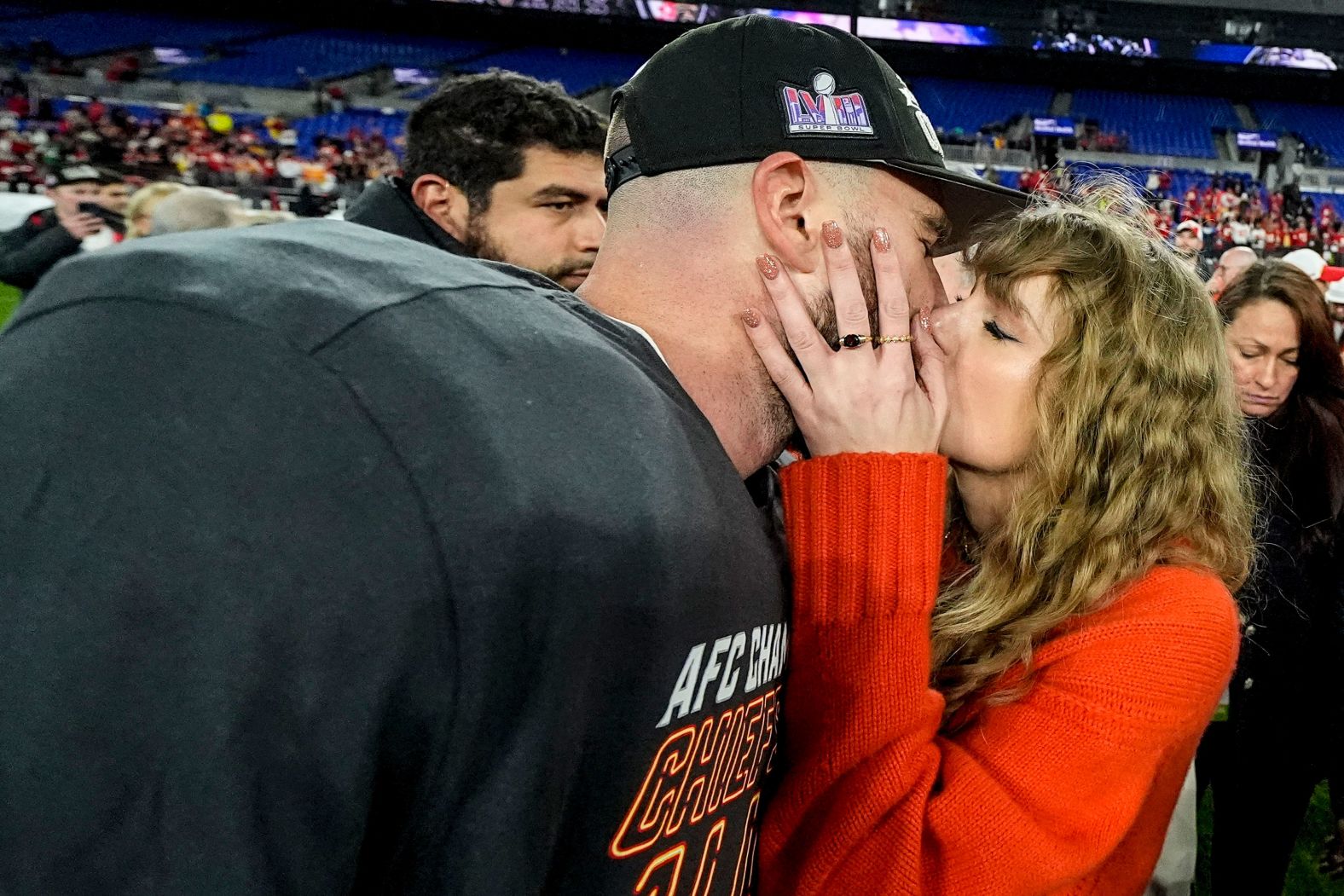 Singer Taylor Swift kisses her boyfriend, Kansas City Chiefs tight end Travis Kelce, after the Chiefs <a href="index.php?page=&url=https%3A%2F%2Fwww.cnn.com%2F2024%2F01%2F28%2Fentertainment%2Ftaylor-swift-travis-kelce-super-bowl%2Findex.html">won the AFC Championship</a> on Sunday, January 28, and clinched a spot in the Super Bowl.