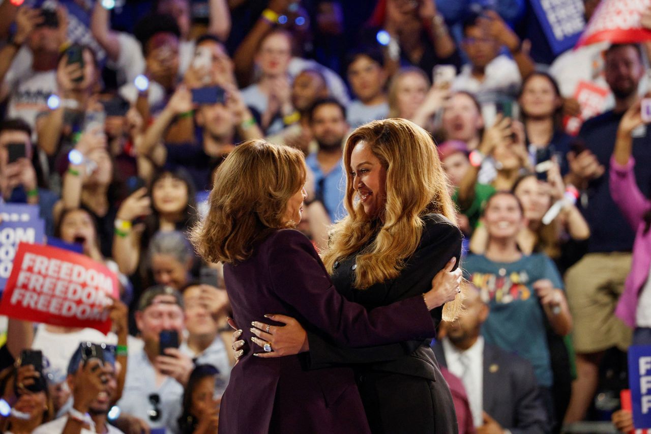 Singer Beyonce and Democratic presidential nominee US Vice President Kamala Harris embrace as they attend a campaign rally in Houston, Texas, on October 25.