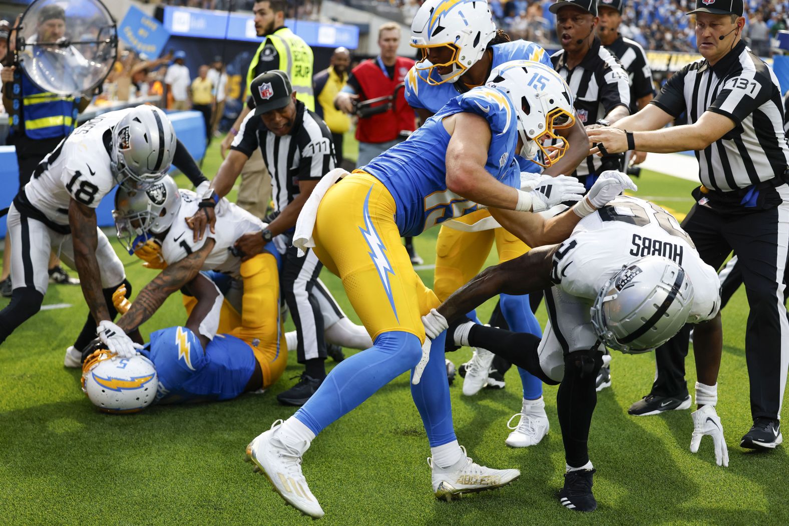 Some of the Los Angeles Chargers and Las Vegas Raiders clash after a play during an NFL game in Inglewood, California, on Sunday, September 8. <a >See the best photos so far from this NFL season</a>.