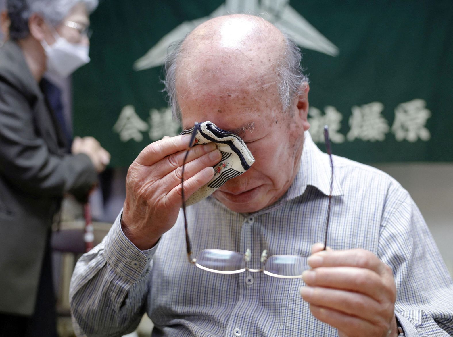 Shigemitsu Tanaka, a member of Nihon Hidankyo, a grassroots Japanese organization of atomic bomb survivors, cries after the group was <a href="https://www.cnn.com/2024/10/11/world/nobel-peace-prize-2024-nihon-hidankyo-nuclear-free-intl/index.html">awarded the Nobel Peace Prize</a> on Friday, October 11. The Norwegian Nobel Committee praised the group “for demonstrating through witness testimony that nuclear weapons must never be used again.”