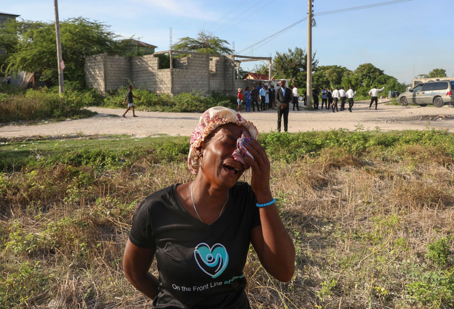 A neighbor cries Tuesday, October 8, during the funeral of Jean Louis Jeune Gracien, who was one of <a href="index.php?page=&url=https%3A%2F%2Fwww.cnn.com%2F2024%2F10%2F04%2Famericas%2Fhaiti-gang-attack-intl-latam%2Findex.html">at least 70 people killed during a gang attack</a> in Pont-Sondé, Haiti. Gang violence in Haiti has proliferated in recent years, with attacks becoming more brazen and violent. The UN reports that at least 3,661 people have been killed since January this year.