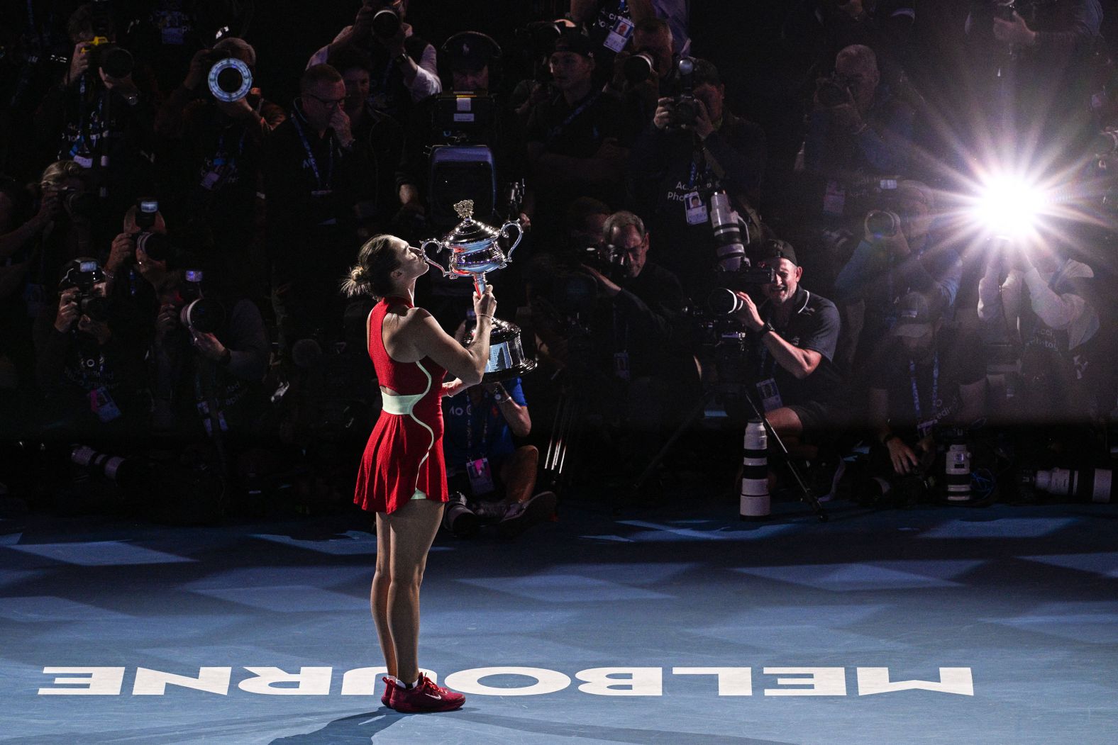 Aryna Sabalenka poses with her trophy after she defeated Zheng Qinwen to <a href="index.php?page=&url=https%3A%2F%2Fwww.cnn.com%2F2024%2F01%2F27%2Fsport%2Faryna-sabalenka-womens-australian-open-title-zheng-2024-spt-intl%2Findex.html">successfully defend her Australian Open title</a> on Saturday, January 27. Sabalenka didn’t lose a single set during the tournament.