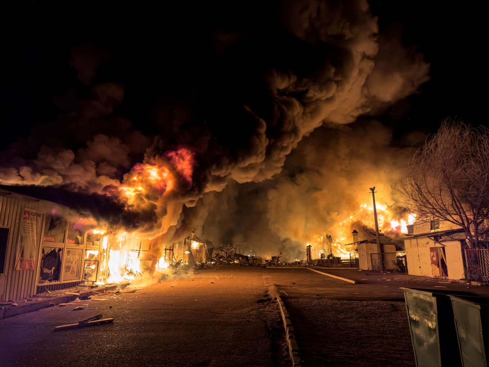 A local market burns after a Russian strike in Mykolaiv, Ukraine, on Tuesday, October 15. <a href="https://www.cnn.com/2024/10/16/europe/zelensky-ukraine-victory-plan/index.html">Ukraine is facing setbacks on its eastern frontline</a>, with Russia claiming incremental advancements in the Donetsk region and continuing to attack Ukrainian cities with drone and missile strikes.