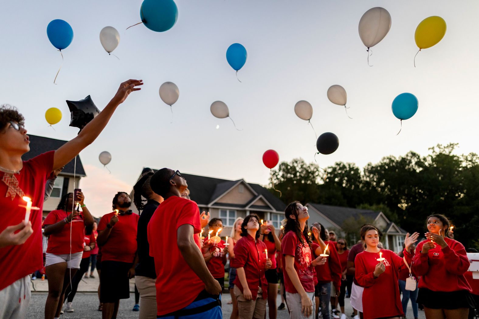 Family and friends release balloons in memory of Apalachee High School shooting victim Mason Schermerhorn during a vigil in his neighborhood in Winder, Georgia, on Saturday, September 7. Schermerhorn was one of four people killed in the <a >school shooting</a>.