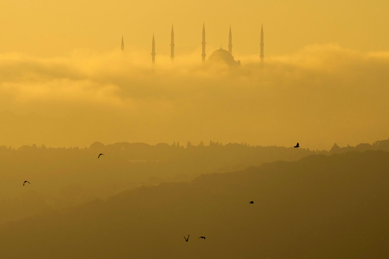 Morning fog engulfs the Çamlıca Mosque in Istanbul on Tuesday, July 2.
